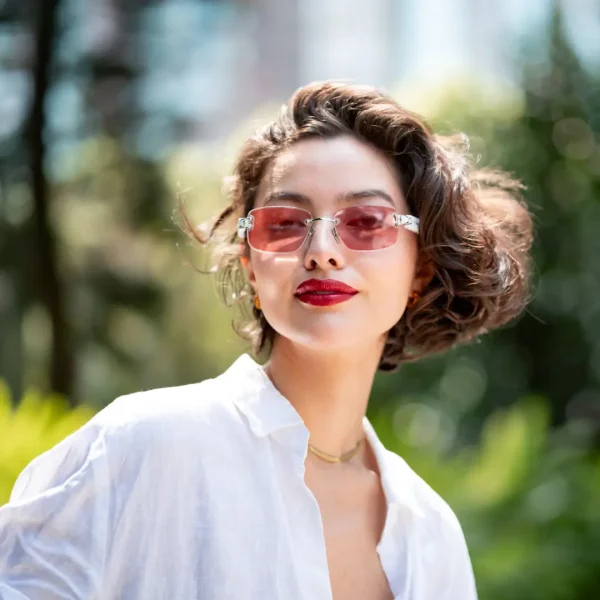 Limited-Time Sale for Summer Surprises AED 99د.إ:Head-turning rimless sunglasses with Prismatic™ Color-changing Lenses